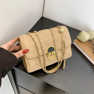 Chic beige quilted leather crossbody bag with golden lock and adjustable chain strap