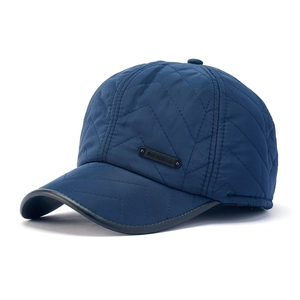 Winter quilted baseball cap for men with fleece lining and ear protection in navy blue