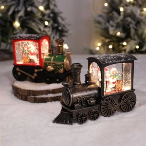 Vintage LED Christmas train lantern with Santa Claus and Snowman in a snowy scene