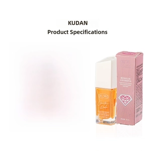 Detail of 10ml amber orange water-based nail polish with white faceted cap and pink box