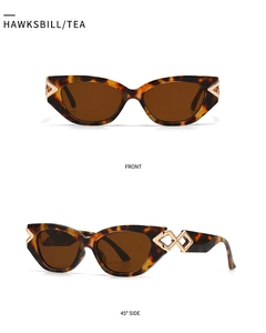 Cat-eye sunglasses in hawksbill and tea lenses with geometric metal temple decor