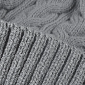 Winter thermal knit beanie with grey ribbed texture and fleece lining for outdoor warmth