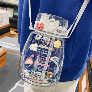 High capacity transparent water bottle with cute 3D stickers and adjustable strap