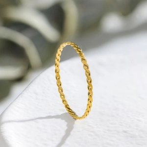 Elegant 18K gold minimalist twisted rope ring made of premium non-tarnish titanium steel