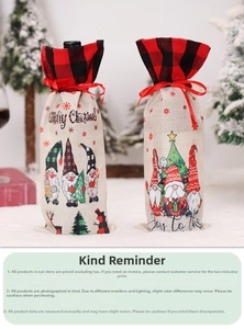 Close-up of linen Christmas wine bottle bags with gnome prints and red ribbon drawstring