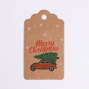 Close-up of brown kraft Christmas tag with a red vintage car and Merry Christmas text