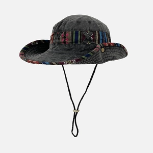 Detail of dark grey sun hat with ethnic embroidered band and adjustable wind rope