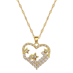 Elegant gold heart pendant necklace with clear crystals and stars on a chic flat chain