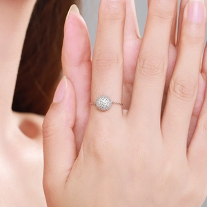 Elegant S925 sterling silver chain ring with pavé diamonds worn on a finger