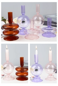 Detailed view of colorful vintage glass candle holders in amber, purple, and pink hues