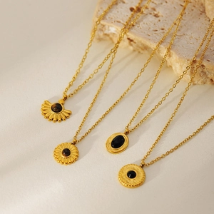 French retro gold-plated stainless steel sunflower necklace with natural black stone