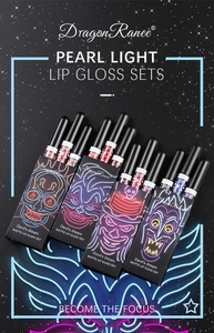 Detail of the Devil's Dream matte lip gloss set with neon devil art packaging