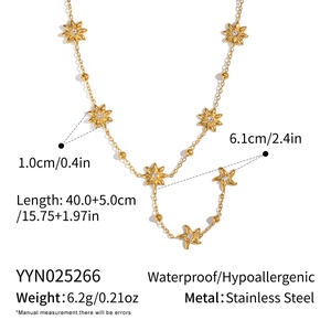 Detail of gold stainless steel necklace with sparkling star charms and size dimensions