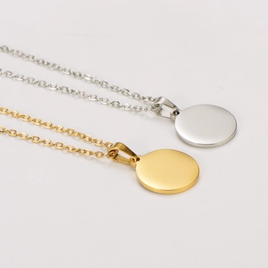 Minimalist stainless steel necklaces in gold and silver with round pendant discs