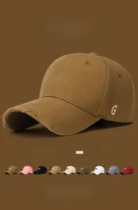 Macro detail of distressed brim on American retro baseball cap with 3D letter embroidery