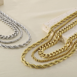Three-piece layered necklace set with Cuban twist and bead chain in gold and silver