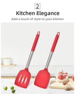 Detail of red silicone spatulas with stainless steel handles and hanging holes