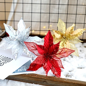 Sparkling artificial poinsettia flowers in gold silver and red for Christmas tree decor