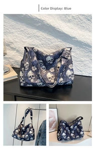 Detailed views of blue nylon tote bag with gothic skull and rose patterns