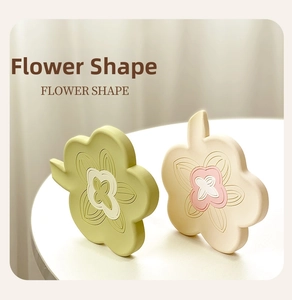 Detailed close-up of floral shaped silicone soap dish with textured relief patterns