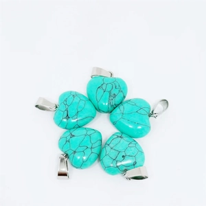 15mm heart-shaped turquoise stone pendants with silver metal clasps on white background