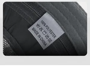 Close-up of the grey quick-dry hat interior with 100% polyester material label