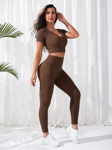 Brown ribbed knit yoga set featuring a V-neck short sleeve top and high waist leggings