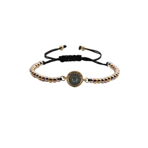 Adjustable evil eye bracelet with gold-plated beads and blue cubic zirconia stones