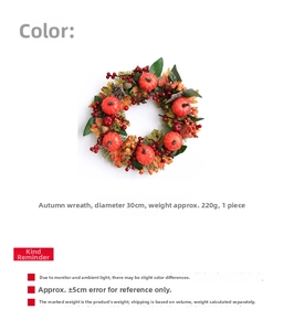 Detail view of 30cm autumn wreath with mini pumpkins, red berries, and maple leaves