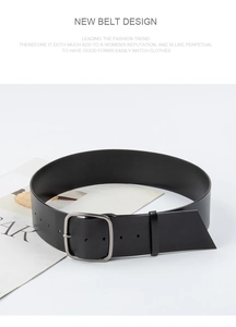 Detail of black wide leather belt featuring a matte silver rectangular pin buckle