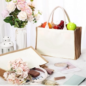 Linen canvas tote bags with brown trim showing large capacity for groceries and flowers