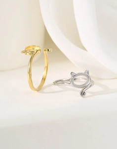 Macro shot of S925 sterling silver cat-shaped open ring mounts in gold and silver finish