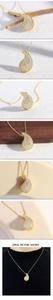 Detailed macro view of gold-plated teardrop necklace with full zircon pavé setting