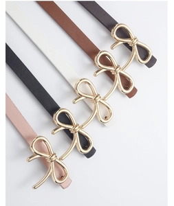 Collection of thin PU leather belts with gold bow buckles in five assorted colors