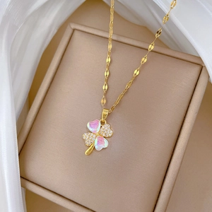 Gold titanium steel four-leaf clover necklace with opal inlay and delicate pave crystals