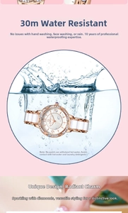 Close-up of rose gold and white ceramic ladies watch showing 30m water resistance
