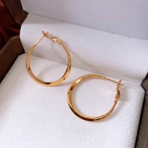 18k gold plated sterling silver needle round hoop earrings with unique spiral design