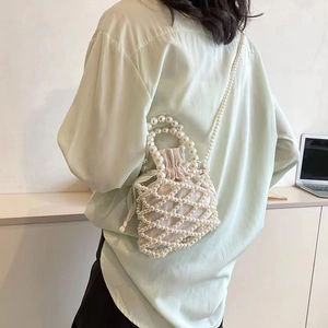 French vintage white pearl woven bucket bag with drawstring liner for women