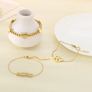 Gold-plated stainless steel mama bracelet set with heart charms and cubic zirconia