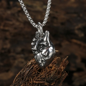 Vintage stainless steel box chain necklace featuring a 3D anatomical heart pendant