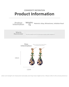 Detail view of ethnic enamel lute earrings with pearls and size 3.8cm by 1.2cm