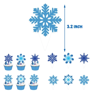 Blue snowflake cake toppers in various sizes for winter theme party table decorations