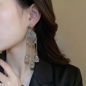 Elegant vintage silver tassel earrings with round totem and delicate metal beads