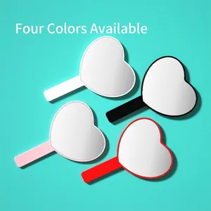 Handheld heart-shaped makeup mirrors set in white, black, pink, and red with portable handles