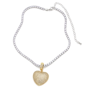Silver tennis chain necklace with gold heart-shaped pendant featuring full zircon inlay