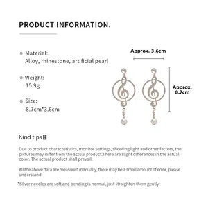 Infographic showing rhinestone treble clef earrings with pearl drop and dimensions
