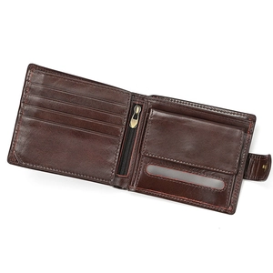 Detail of dark brown leather wallet showing card slots, coin pocket, and zipper compartment
