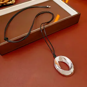 Minimalist Alloy Twisted Oval Pendant Necklace With Black Long Cord For Women Modern Geometric Style