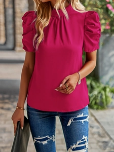 Detail of rose red puff sleeve blouse with stand collar and elegant shiny fabric texture