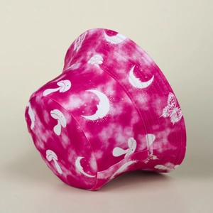 Detail of canvas bucket hat featuring pink tie-dye and white mushroom butterfly prints